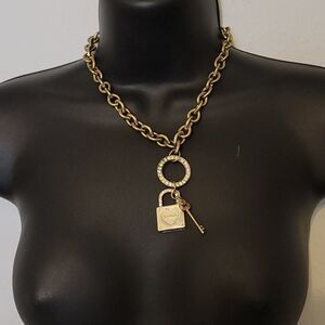 - Bebe lock necklace